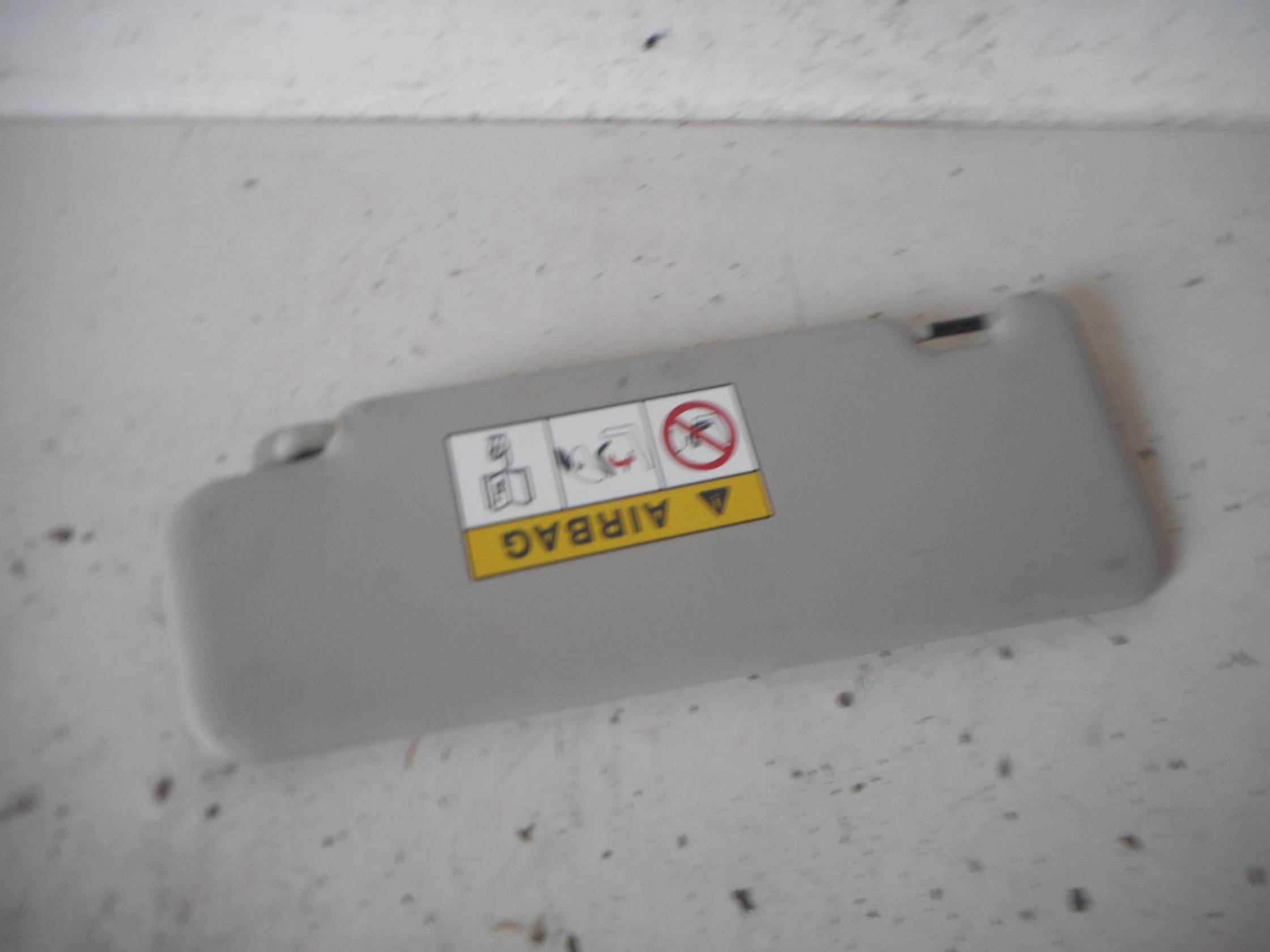 Aletta parasole parabrezza dx.